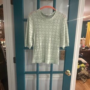 Light green lace blouse size large.
